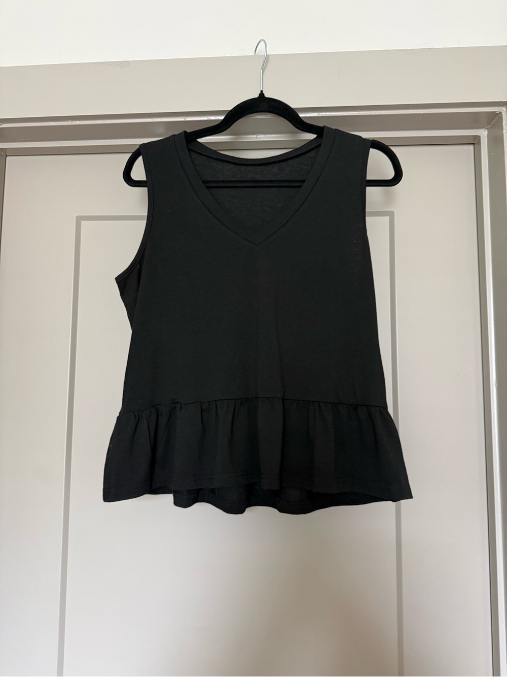 Women’s Black V-Neck Ruffle Hem Tank Top